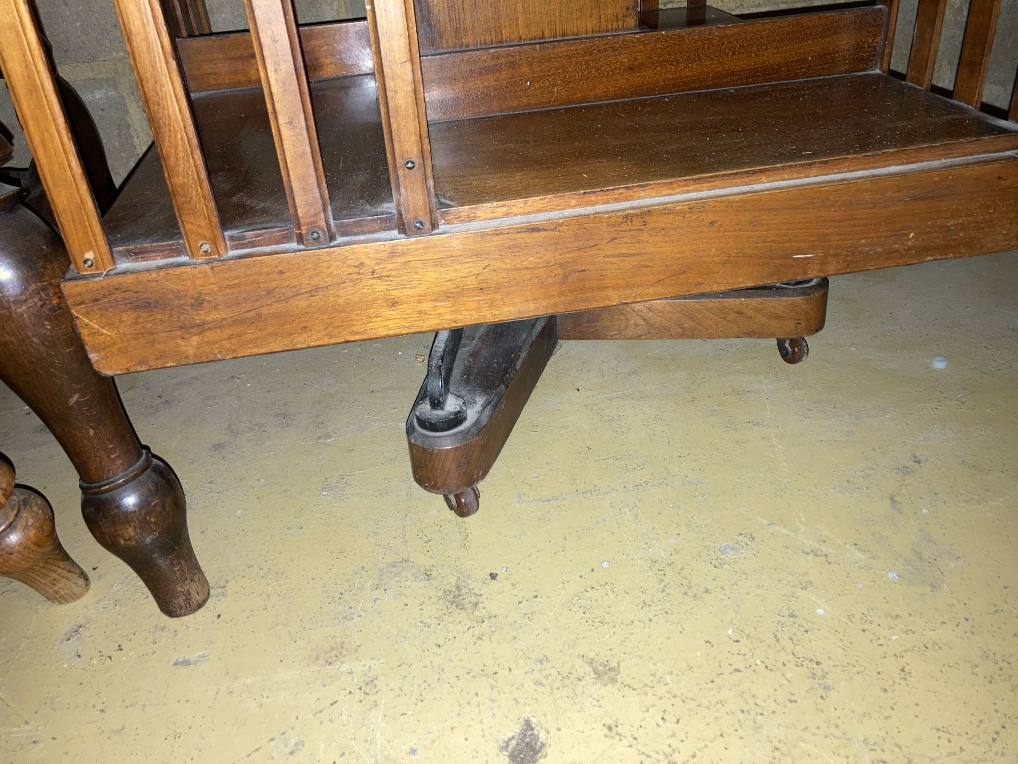 An Edwardian walnut revolving bookcase, width 56cm, height 96cm